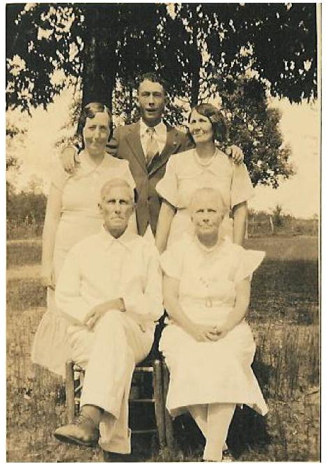  Sitting-Jim W. Temple and Charley Anice (Annie) McKay Temple. Standing L-R: Velma, Doyle and Bessie Mae Temple.