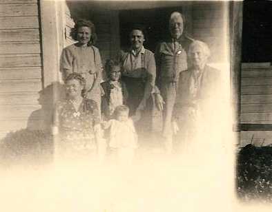 Standing at the back, L-R: Dorothy Workman, unsure of this little girl, my grandmother from Australia: Olive Gertrude Forbes-Jamieson Davis, Mr. Reaves.  Below, L-R: Bessie Mae Temple, Jeannette Kaye Ingram (Royal James and Norma Shirley Davis Ingram's first daughter) and Charley Annie McKay Temple Reaves.