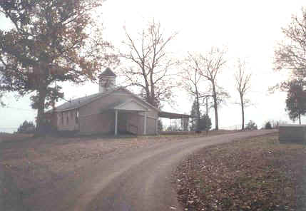 The Lone Valley Church is between Pencil Bluff and Sims right off the road. Photo taken Sept. 2000.