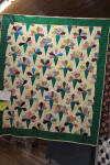 This quilt with blocks on point has an inner border and outer border. The quilt borders frame the quilt and increases the size of a quilt and makes it look nicer.
