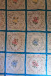 Rose sampler - quilted by shop at Acron. Machine quilted - machine pieced - -hand appliqud in 2010. Embroidery is still in. 