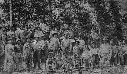 Work crew.  It was typical of men to wear overalls with a wide brimmed hat.