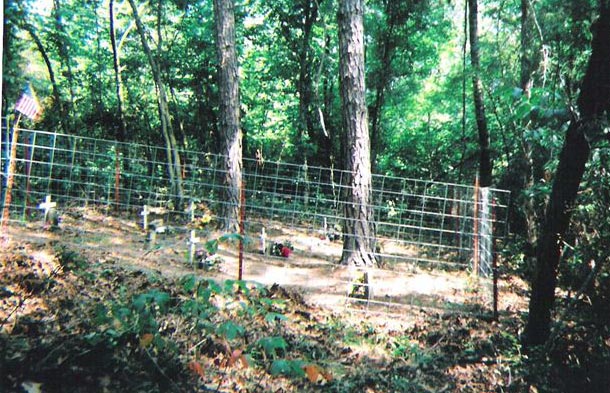 small cemetery with wire fence